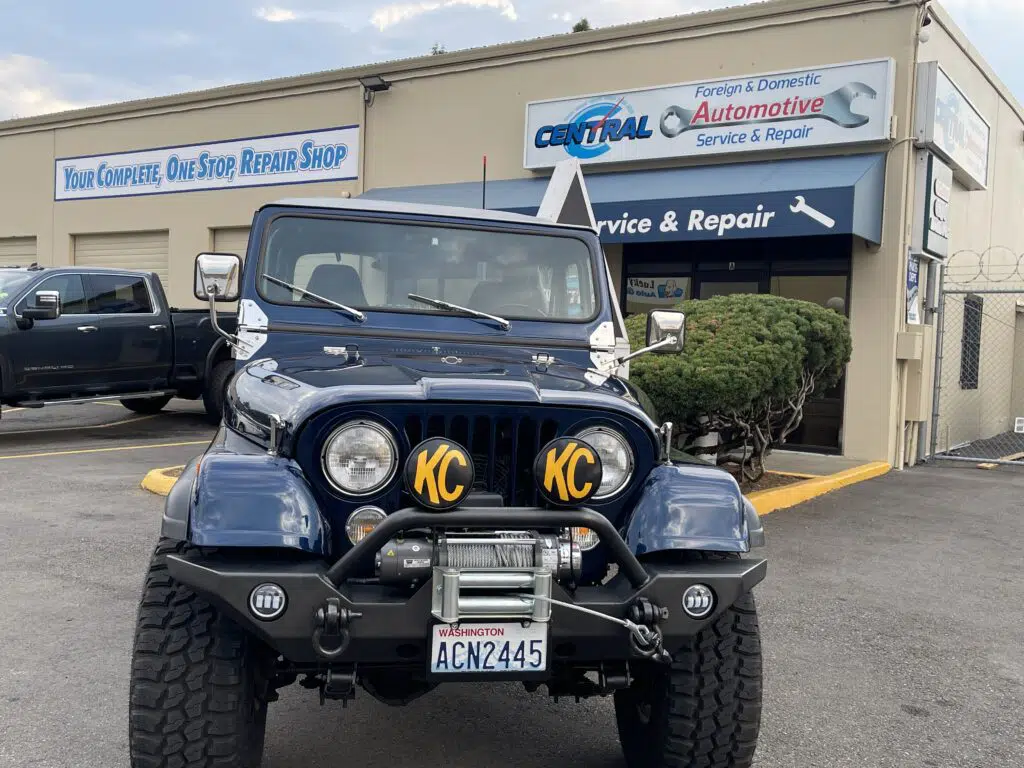Blue Jeep in front of Central Avenue Automotive